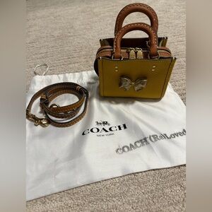 Coach yellow orange mini rogue 12